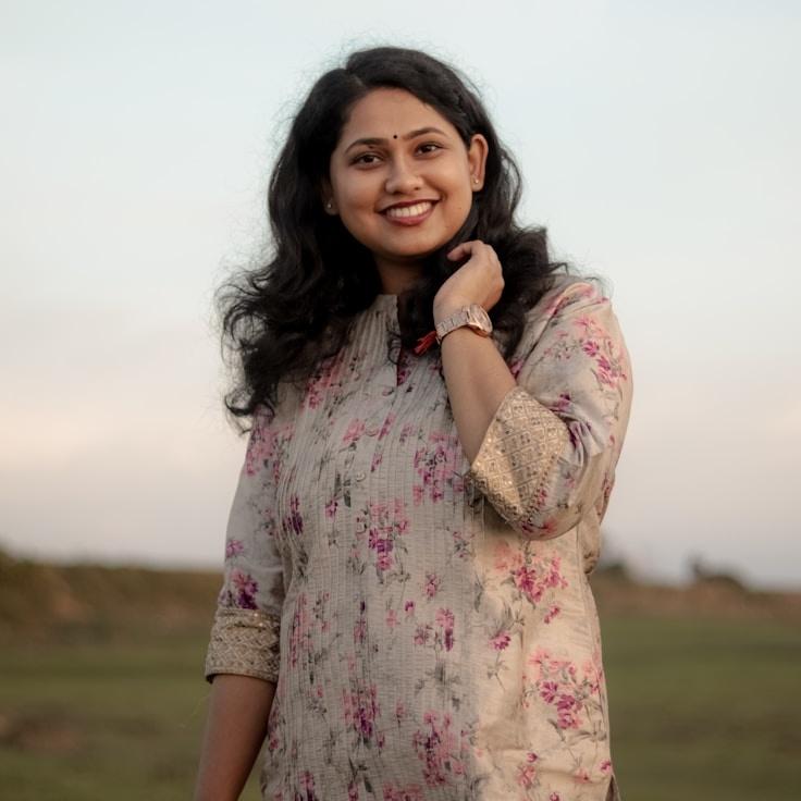 Portrait of Mira Chen, group coordinator and fusion cooking expert